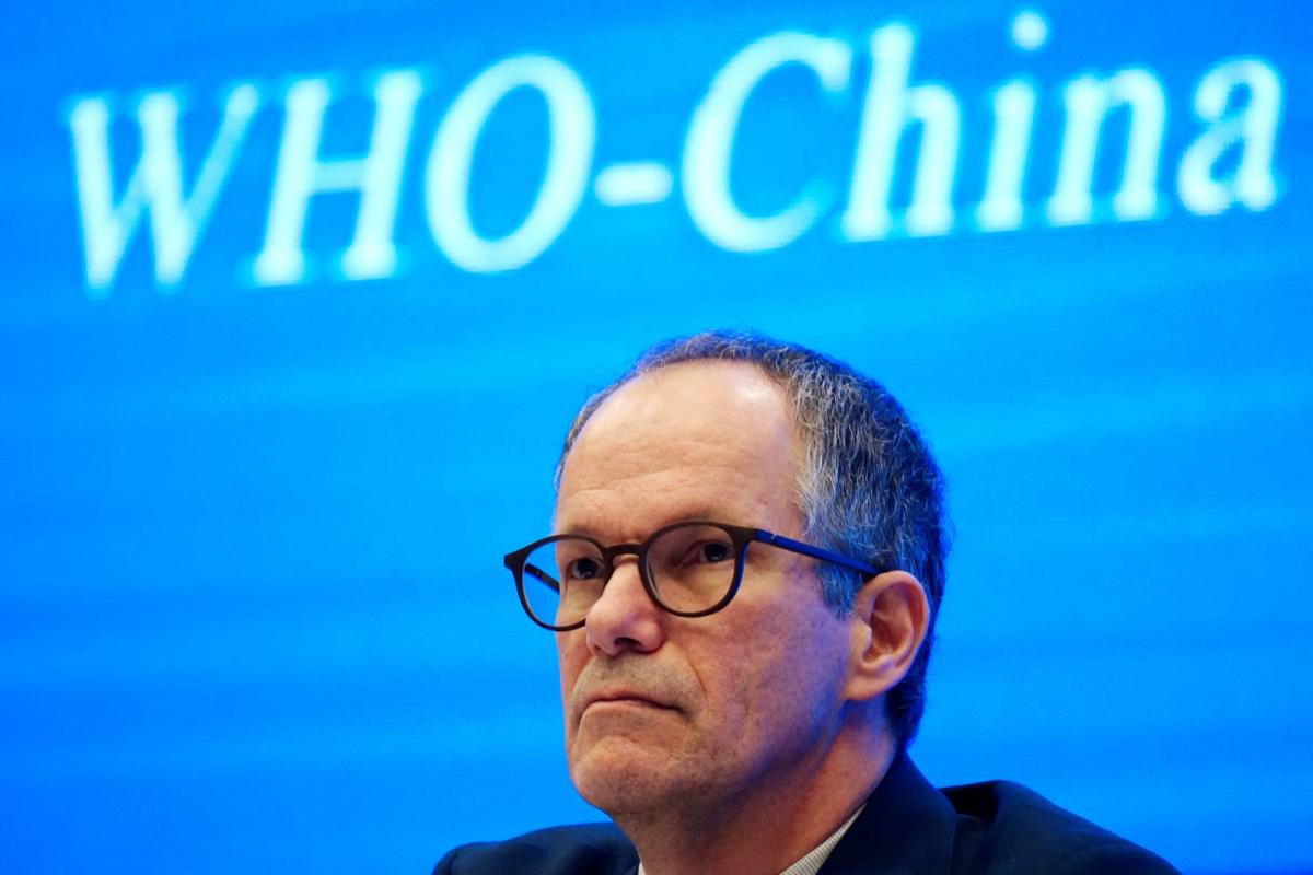 WHO team at a news conference in Wuhan