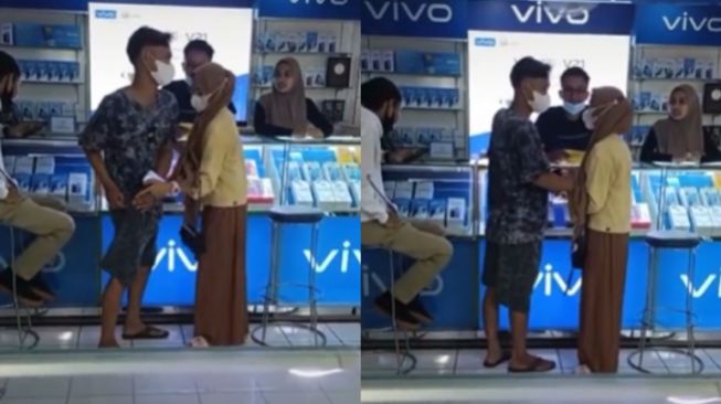 58582-viral-wanita-merengek-di-konter-hp-paksa-sang-pacar-minta-dibelikan-iphone