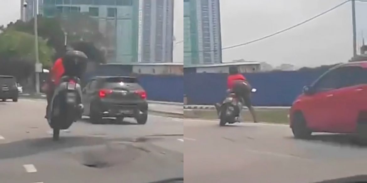 Motosikal langgar jalan raya berlubang