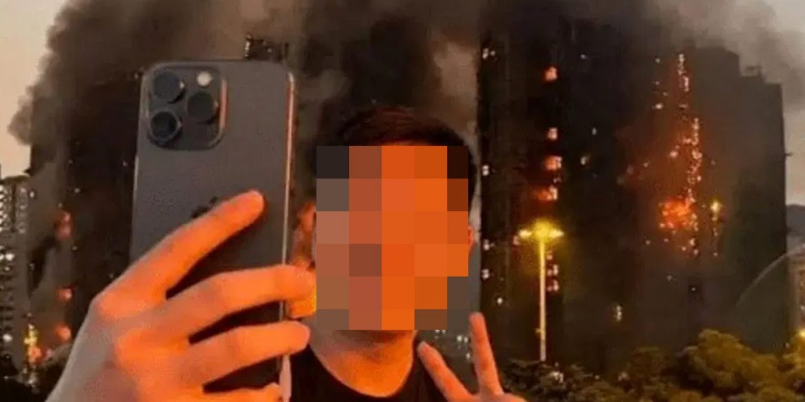 YouTuber Ditahan Lepas Bergambar Dengan Isyarat 'Peace' Berlatarkan Insiden Kebakaran Hong Kong